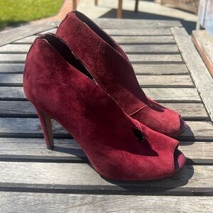 Halogen maroon leather heels with stud detail on heel. Size 6M.